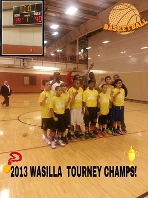 Players (from left-to-right) are:  Alvin Skipworth, Jailon Johnson, Braun Ohlsun, Daishen Nix, Diquez Norment, Isaiah Moses, Bryce Muller and Danilo Guzman.  Pictured in the back are:  Coach Jesse, Assistant Desmond Johnson, Assistant Amir, Assistant Coach Brian Keith.